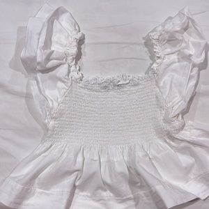 White ruffle top